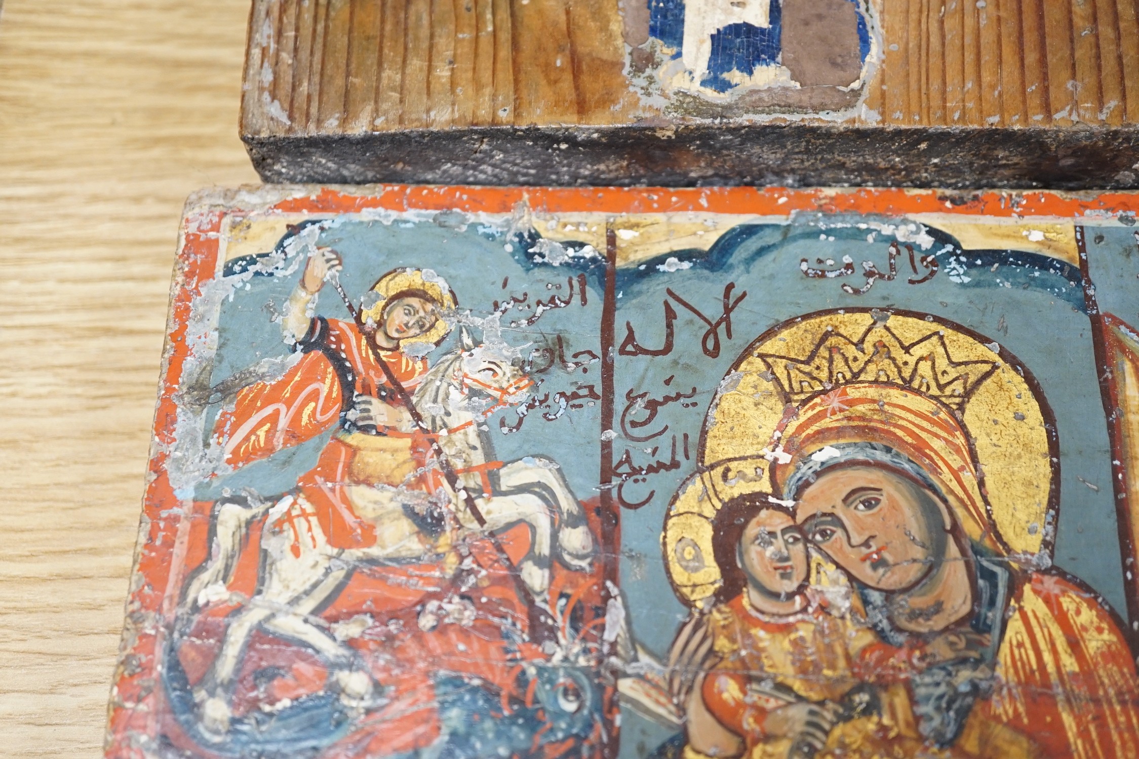 Two polychrome icons, largest 30cms high